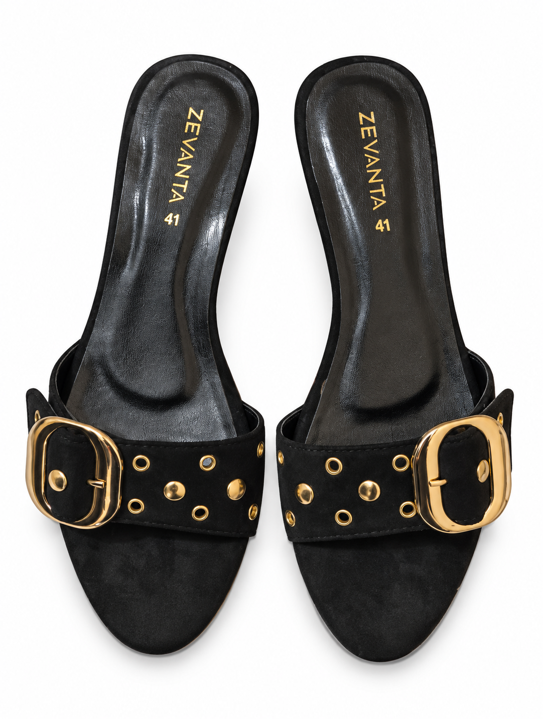 Black buckle mules with gold-tone eyelets on a white background